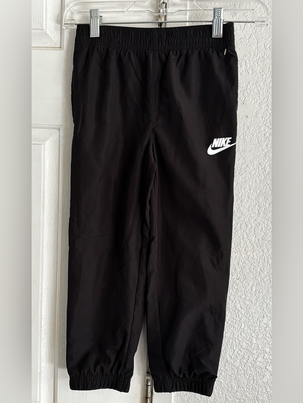 Nike Black Jogger Sweatpants with White Swoosh size Small 4/5